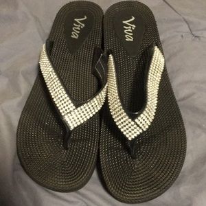 Jeweled flip flops.